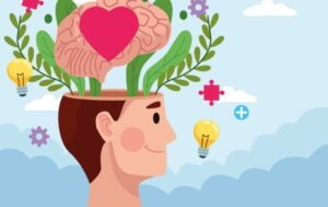 Un rostro sonriente de un hombre de cuya cabeza emergen un corazón y un cerebro, metáfora de haber asistido al curso práctico de inteligencia emocional en Sabadell